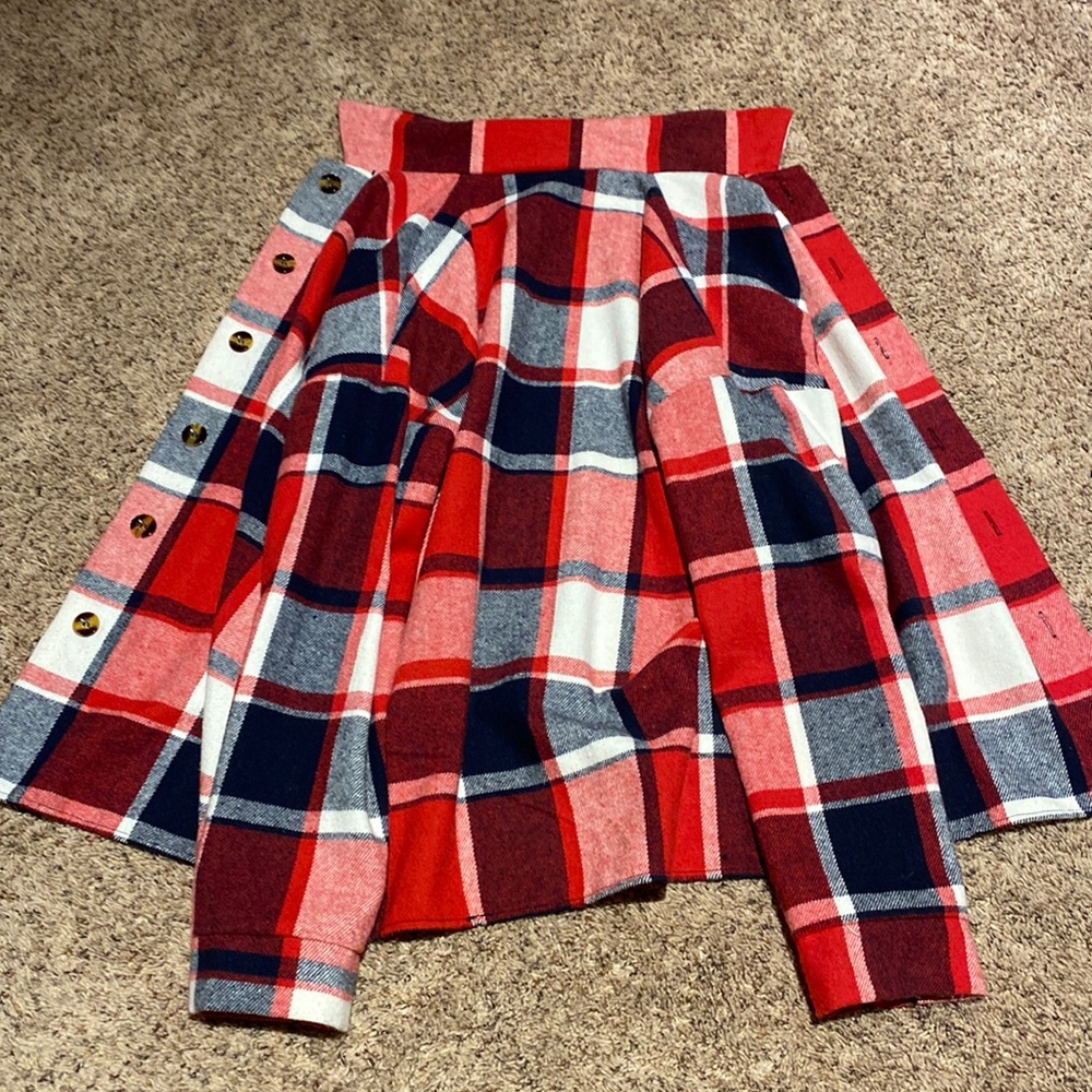 A beautiful flannel that is red white and blue. 35% made with cotton